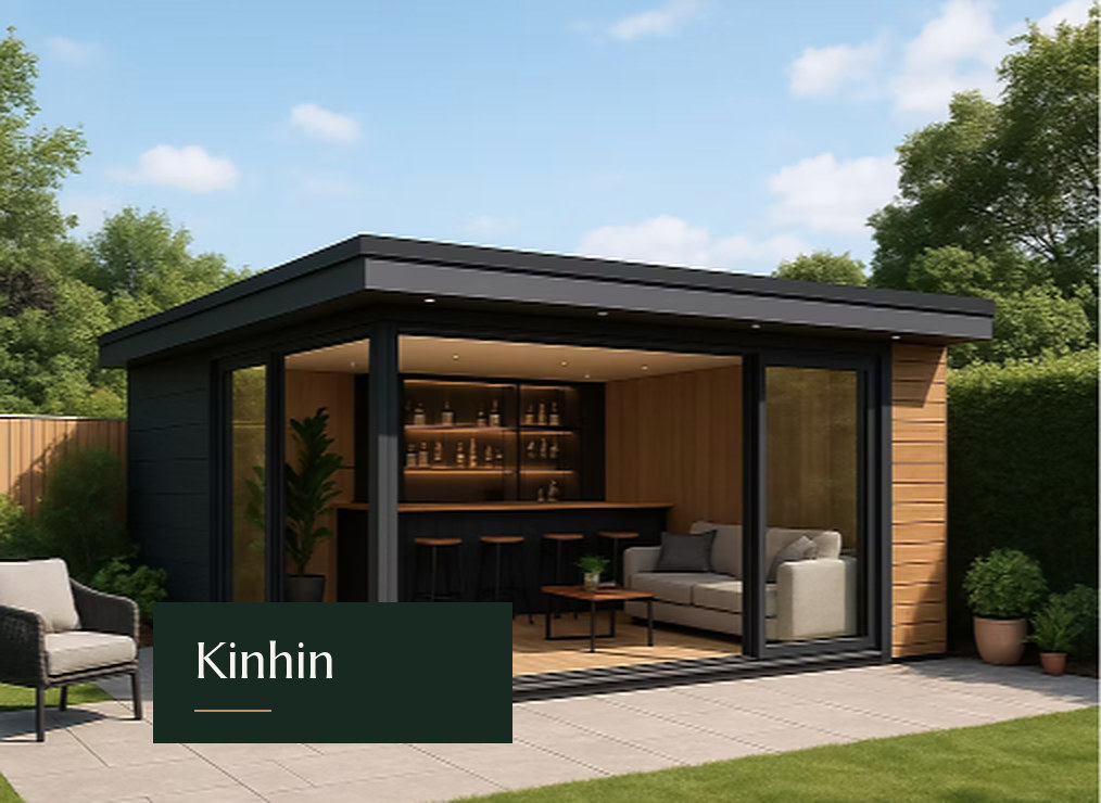 Kinhin studio with a wraparound roof canopy, corner glazing and a bar opening onto a terrace